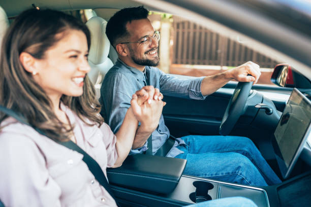 istock Young couple in the car 2198078163