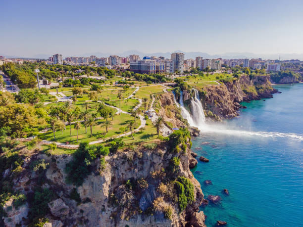 istock Lower Duden Falls drop off a rocky cliff falling from about 40 m into the Mediterranean Sea in amazing water clouds. Tourism and travel destination photo in Antalya, Turkey. Turkiye. 2198084914