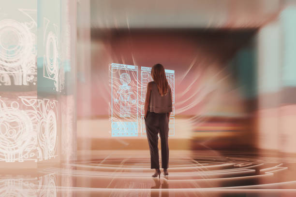 istock Businesswoman standing in VR environment 2198089088