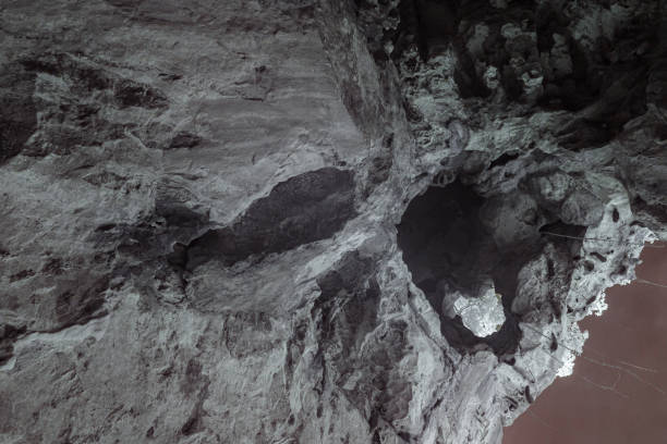 istock Infrared photography, a rocky cave or tunnel structure with various textures and shapes 2198089575