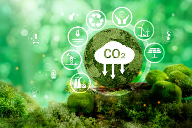 istock Carbon credit icon on grass surface planet.  Carbon credit concept. Tradable certificate to drive industry 2198089706
