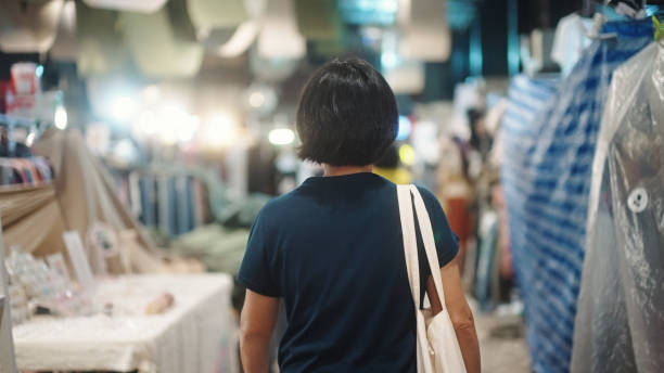 istock Carry reusable bag at night market. 2198093222