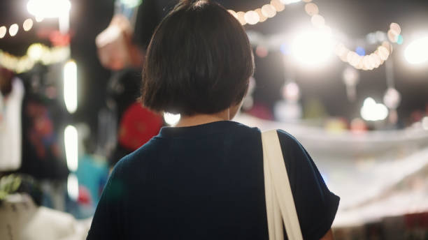 istock Carry reusable bag at night market. 2198093229
