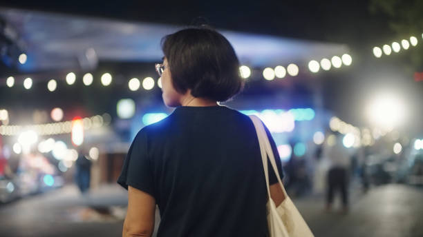 istock Carry reusable bag at night market. 2198093236