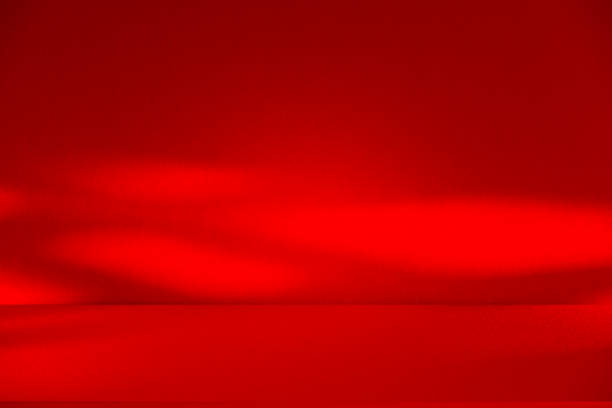 istock Wall interior background, studio and backdrops show products.with shadow from window color red . background for text insertion and presentation product 2198094399
