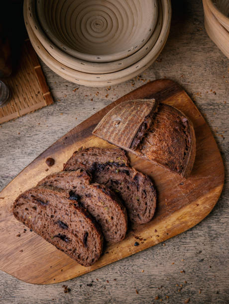 istock Freshly Baked Artisan Chocolate Sourdough Bread on Wooden Table. 2198097025