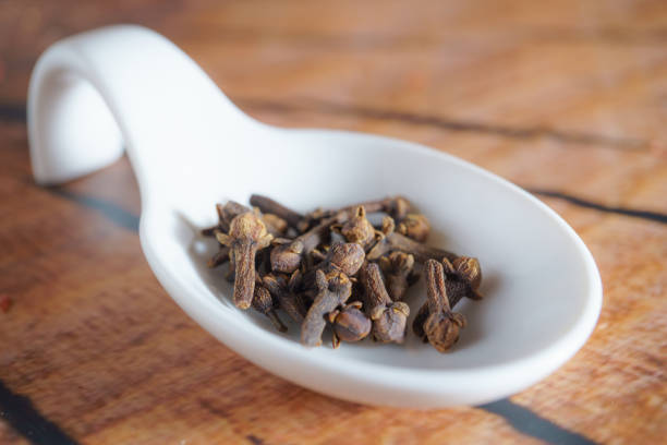 istock clove seeds in a white spoon 2198098907