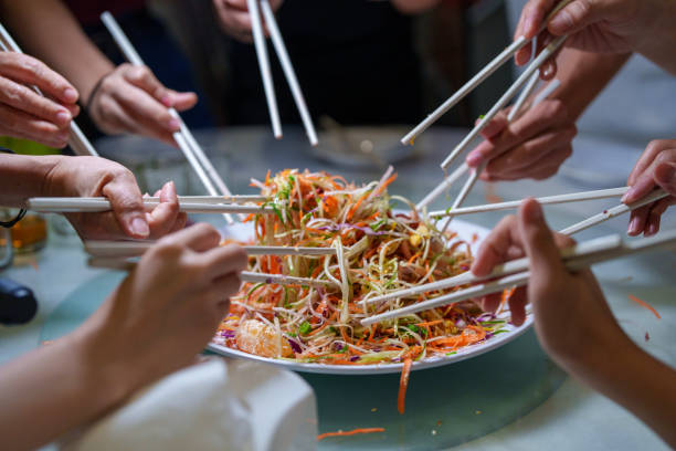 istock Traditional Yee Sang Toss for Chinese New Year Celebration 2198098928