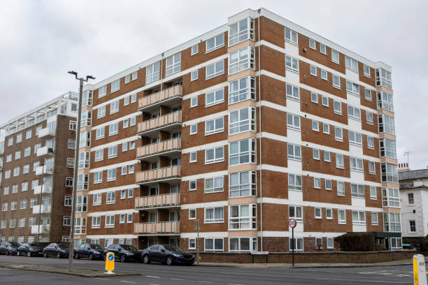 istock Modern apartment building on a street corner 2198104076