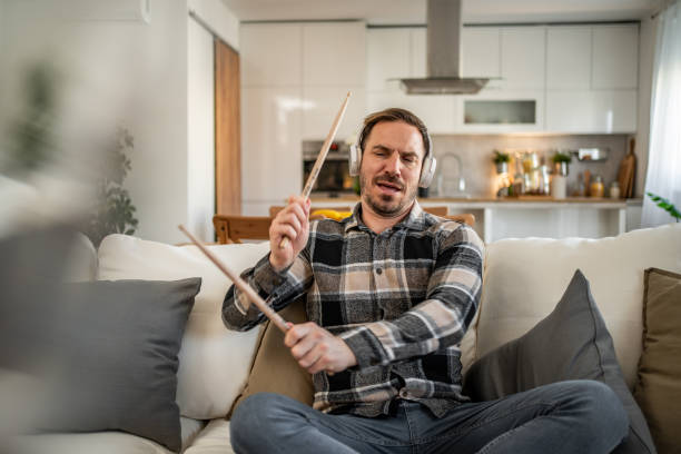 Man drumming in the air with passion and energy