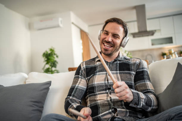 istock Air drumming - Man enjoying his imaginary drums 2198110264