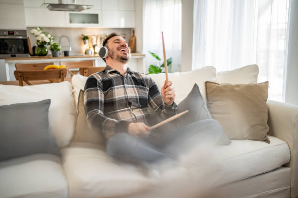 istock Air drumming - Man enjoying his imaginary drums 2198110266
