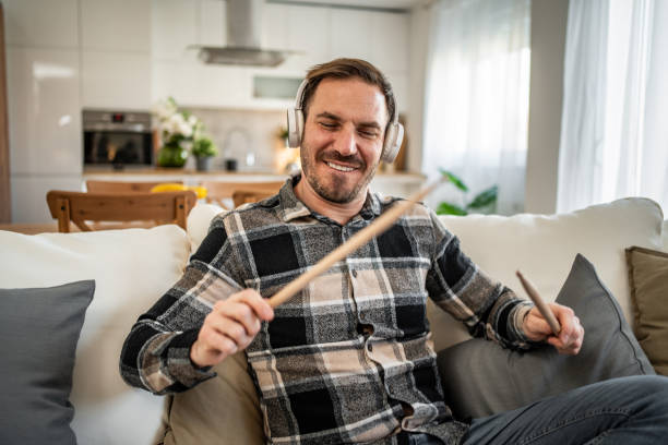 istock Air drumming - Man enjoying his imaginary drums 2198110271