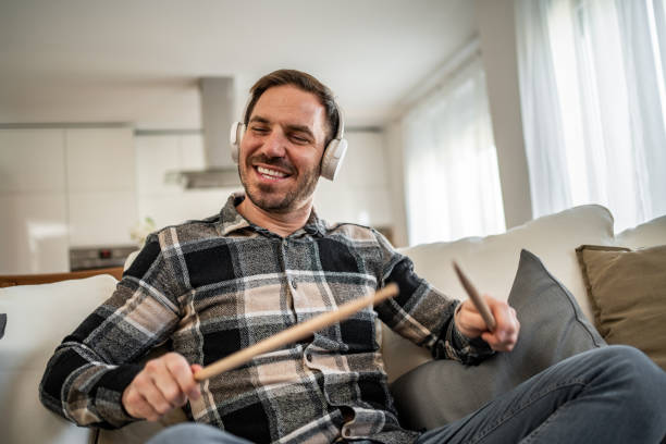 istock Air drumming - Man enjoying his imaginary drums 2198110327