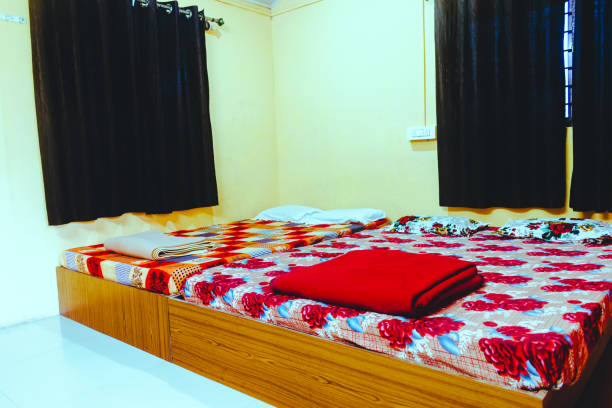 istock Interior of vintage style bedroom with with window curtains. 2198113175