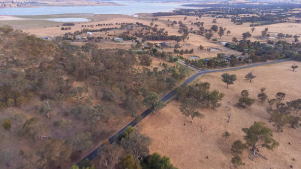 istock Farmland in drought countryside with lake 2198113985