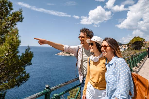 istock Friends enjoying scenic view in dubrovnik 2198114233