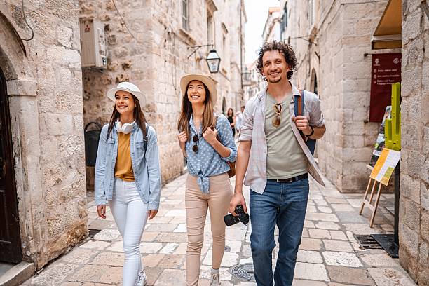 istock Young adults exploring historic dubrovnik streets 2198114404