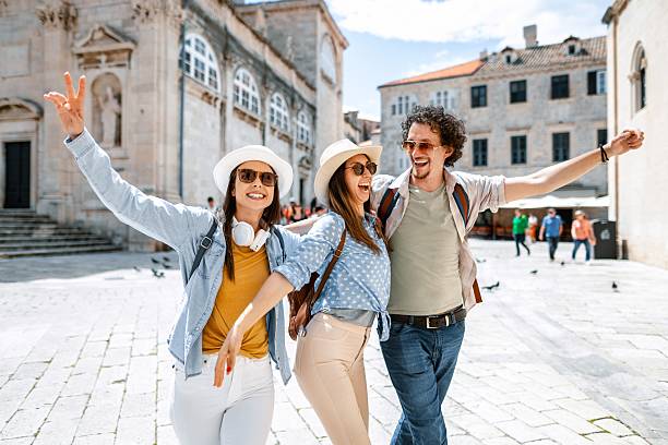 istock Joyful friends exploring dubrovnik streets together 2198114681