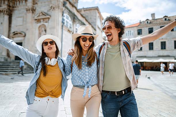 istock Joyful friends exploring historic dubrovnik streets 2198114870