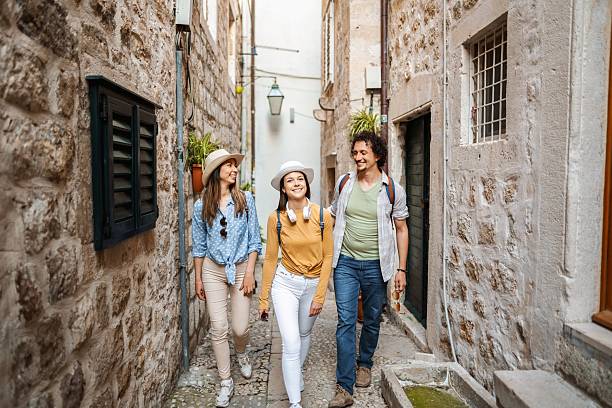 istock Young adults exploring historic dubrovnik alleyway 2198115410