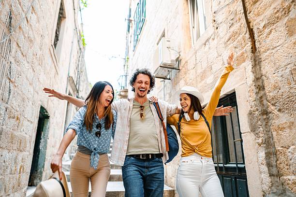 istock Friends enjoying a lively stroll in dubrovnik 2198115613