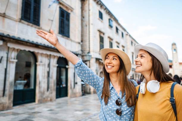 istock Young women exploring historic dubrovnik streets 2198115873