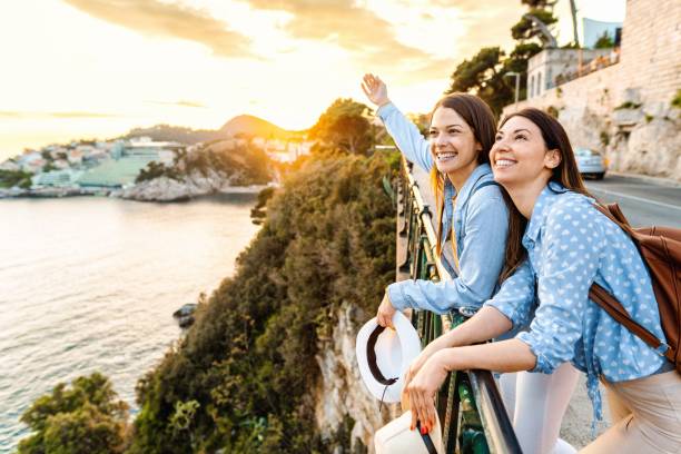 istock Young adults enjoying scenic dubrovnik coastline 2198115902
