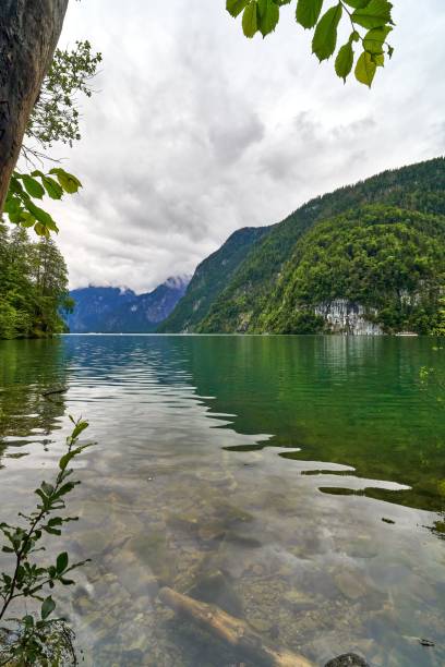 istock Tranquil Lake and Lush Mountains 2198118533