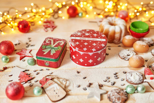 istock Christmas cake and sweets on table. Christmas decorations with lights background. Happy New Year! Christmas greeting card. Winter card template. Xmas concept. Holiday Banner. Feast of Nativity. 2198120235