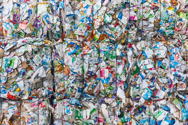 istock Recycled and packaged waste. Sustainable industry. Reusable material 2198120632