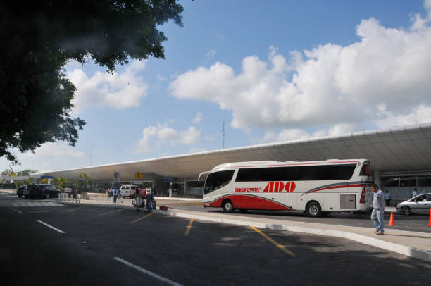 Cancun, Mexico- May 18, 2013: Cancun is a fantastic tourist destination in Mexico and this batch is an album of the airplanes in Cancun Airport. Here is external view of the terminal buiding of Cancun International Airport.