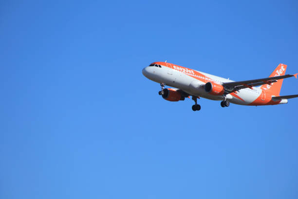 Luqa, Malta - 9 August 2023: Head on view of an Easyjet holiday jet arriving at the terminal at Malta International Airport