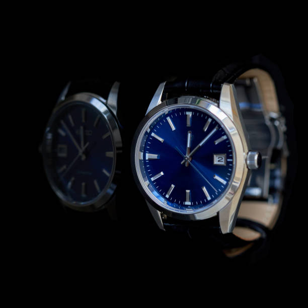 istock mechanical watch lies on a dark background 2198124035