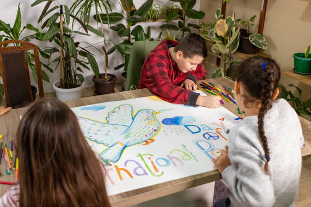 istock Guiding Kids to Draw Peace 2198128111