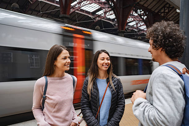 istock Young adults socializing at copenhagen train station 2198128212