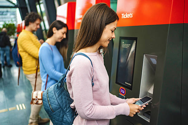 istock Young adults using ticket machines in copenhagen 2198128438