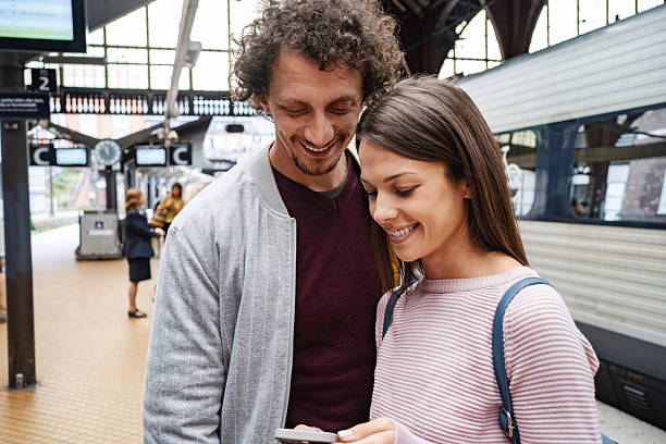 istock Young couple enjoying time at copenhagen train station 2198128745