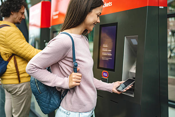 istock Young adults using ticket machines in copenhagen 2198128799