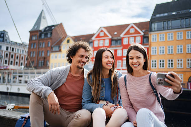 istock Friends taking a selfie in colorful copenhagen 2198129237