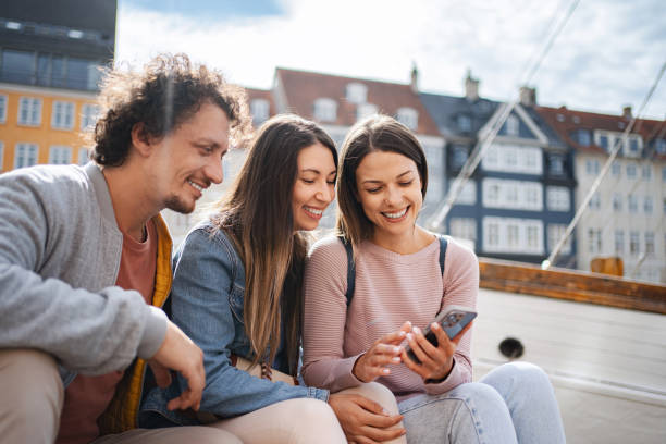 istock Young adults enjoying time together in copenhagen 2198129255