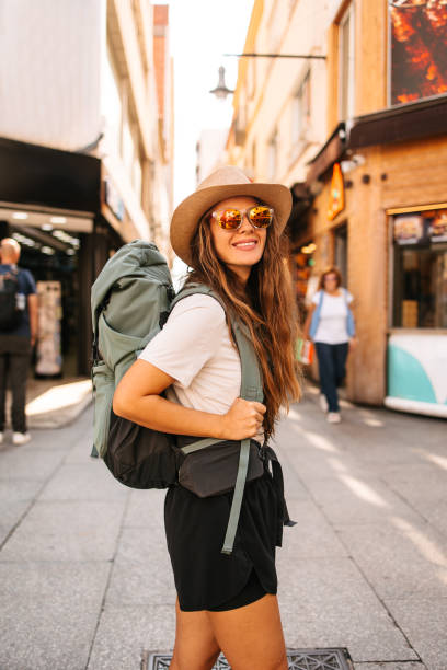 istock Tourist standing on the street 2198129347