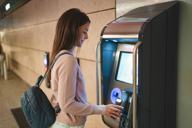 istock Young adult using ticket machine in copenhagen 2198130360