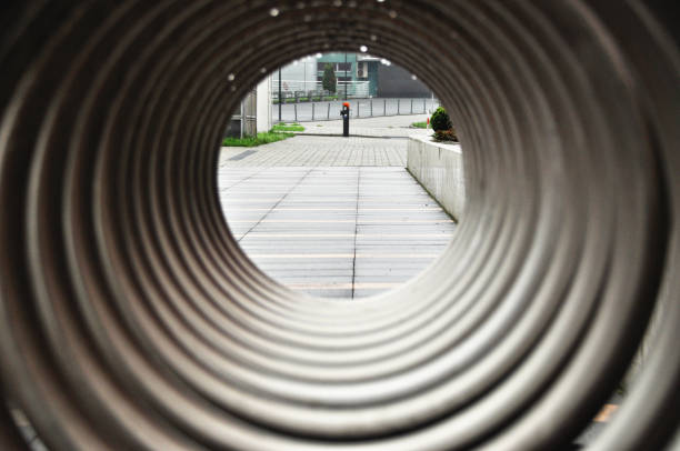 istock Wet metal frame structure hoops, raindrops on the bike rack 2198130541