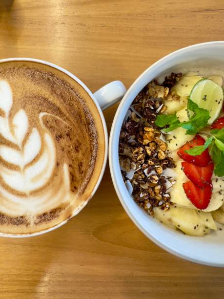 istock Smoothie bowl with bananas, berries, granola and other ingredients 2198130924