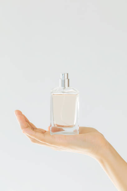 istock Elegant Perfume Bottle on Hand – Luxury Fragrance Concept 2198131506