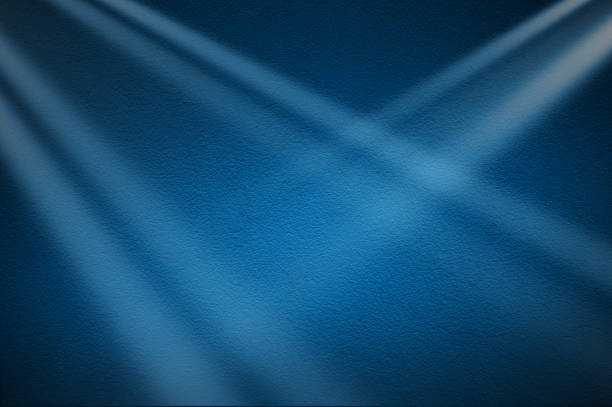 Elegant blue light rays on dark blue background. Abstract blue light background. Banner design