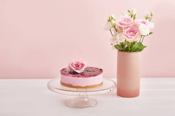 istock Easter composition with sweet bread, Easter cake, eggs, bouquet of flowers. Holidays breakfast concept with copy space. Traditional easter cake with gingerbread cookies. Easter Greeting Card Template. 2198132611