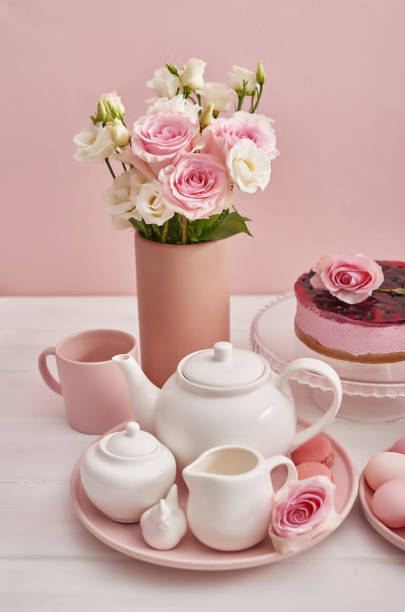 istock Easter composition with sweet bread, Easter cake, eggs, bouquet of flowers. Holidays breakfast concept with copy space. Traditional easter cake with gingerbread cookies. Easter Greeting Card Template. 2198132783