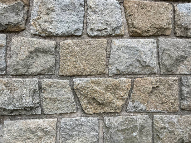 istock The texture of the stone wall. 2198137702